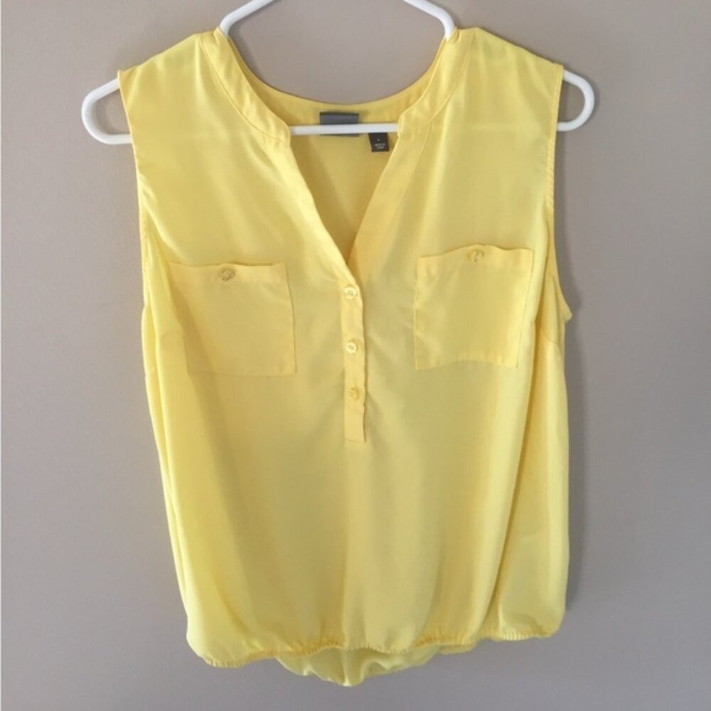 Yellow sleeveless blouse